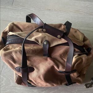 Filson Medium Rugged Twill Duffel Bag in Tan with Brown Leather Straps